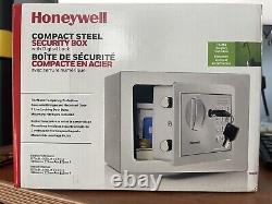 Honeywell Steel Standard Safe with Keypad Lock, White, 0.15 cu. Ft. (5605W)